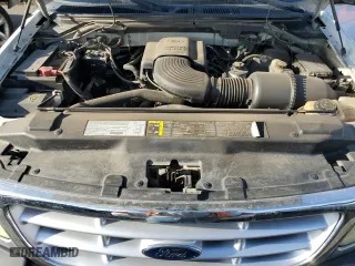 2003 Ford F-150 Work Series with VIN 2FTRX17WX3CA63767, listed as a Copart auction lot 84299684 with 165,719 mi miles and Salvage Title. Bid and sale history available at carsss.com. Image 11.