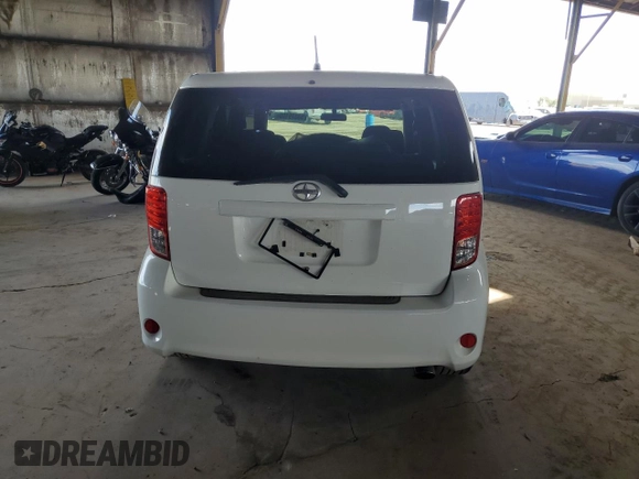 2012 Scion xB with VIN JTLZE4FE2CJ028761, listed as a Copart auction lot 53379165 with 131,758 mi miles and Salvage Title. Bid and sale history available at DreamBid. Image 6.