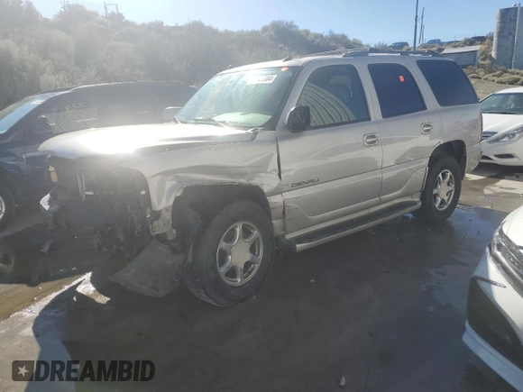 2005 GMC Yukon Denali z VIN 1GKEK63U35J228887, wystawiony jako Copart lot #68141304 z przebiegiem 238 024 mil mil oraz Szkoda całkowita • Salvage title. Historia ofert i sprzedaży dostępna na DreamBid. Obrazek 1.