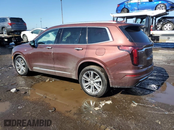 2023 Cadillac XT6 AWD Premium Luxury z VIN 1GYKPDRS0PZ112068, wystawiony jako Copart lot #46538575 z przebiegiem 52 016 mil mil oraz Szkoda całkowita • Salvage title. Historia ofert i sprzedaży dostępna na DreamBid. Obrazek 2.