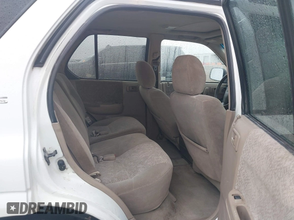 2001 Isuzu Rodeo S with VIN 4S2DM58WX14315138, listed as a IAAI auction lot 41535619 with 217,960 mi miles and . Bid and sale history available at DreamBid. Image 8.