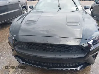 2022 Ford Mustang EcoBoost with VIN 1FA6P8TH8N5140335, listed as a IAAI auction lot 42507630 with 9,724 mi miles and . Bid and sale history available at DreamBid. Image 6.