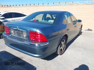 2001 Lincoln LS w/Base Pkg with VIN 1LNHM87A31Y617332, listed as a IAAI auction lot 41317767 with 141,931 mi miles. Bid and sale history available at carsss.com. Image 4.