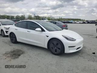2021 Tesla Model 3 Standard Range Plus z VIN 5YJ3E1EAXMF973450, wystawiony jako Copart lot #52766645 z przebiegiem 66 827 mil mil oraz Szkoda całkowita • Salvage title. Historia ofert i sprzedaży dostępna na DreamBid. Obrazek 4.