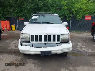 1997 Jeep Grand Cherokee Limited z VIN 1J4GZ78S1VC536295, wystawiony jako IAAI lot #42435292 z przebiegiem 310 005 mil mil oraz . Historia ofert i sprzedaży dostępna na DreamBid. Obrazek 13.