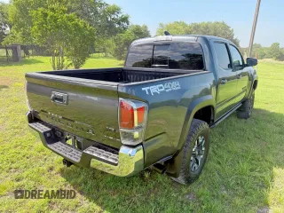 2021 Toyota Tacoma SR с VIN 3TMCZ5AN3MM441215, выставлен на аукционе Copart как лот 64744385 с пробегом 30 503 миль миль и Списание • Salvage title. История ставок и продаж доступна на DreamBid. Изображение 4.