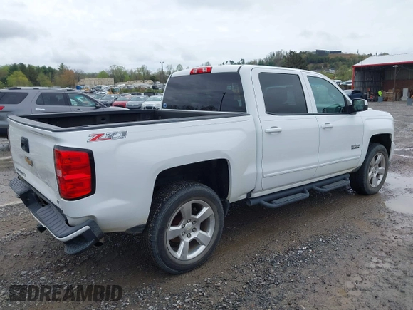2016 Chevrolet Silverado 1500 LT with VIN 3GCUKREC0GG136136, listed as a IAAI auction lot 41971199 with 179,045 mi miles and . Bid and sale history available at DreamBid. Image 4.