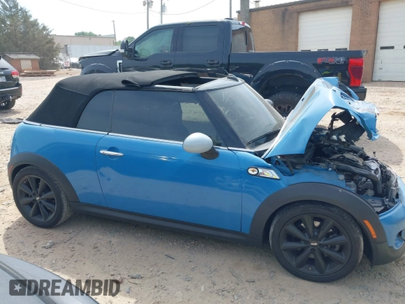 2013 MINI Convertible S with VIN WMWZP3C53DT705016, listed as a IAAI auction lot 42155802 with Not provided miles and . Bid and sale history available at DreamBid. Image 13.