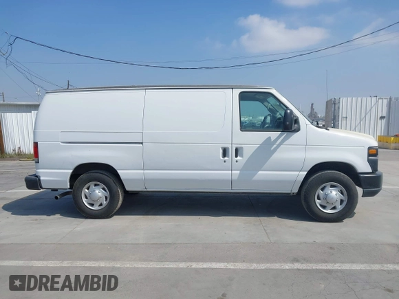 2014 Ford Econoline Cargo Commercial with VIN 1FTNE1EW4EDA90117, listed as a IAAI auction lot 42063775 with 276,021 mi miles and . Bid and sale history available at DreamBid. Image 13.