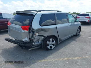 2013 Toyota Sienna LE AAS with VIN 5TDKK3DC4DS399295, listed as a IAAI auction lot 42173970 with 128,350 mi miles and . Bid and sale history available at DreamBid. Image 4.