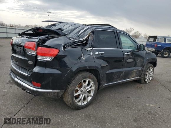 2015 Jeep Grand Cherokee Summit with VIN 1C4RJFJG2FC913658, listed as a Copart auction lot 52160035 with 138,008 mi miles and Salvage Title. Bid and sale history available at DreamBid. Image 3.