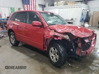 2011 Suzuki Grand Vitara Premium with VIN JS3TD0D25B4102081, listed as a Copart auction lot 43978955 with 310,535 mi miles and Salvage title. Bid and sale history available at DreamBid. Image 4.