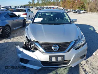 2018 Nissan Altima SR with VIN 1N4AL3AP8JC474583, listed as a IAAI auction lot 40923589 with 116,960 mi miles and . Bid and sale history available at DreamBid. Image 12.