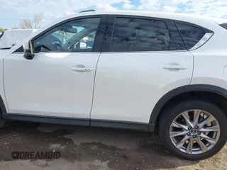 2019 Mazda CX-5 Grand Touring with VIN JM3KFBDM8K0518576, listed as a IAAI auction lot 41854296 with 88,706 mi miles and . Bid and sale history available at carsss.com. Image 14.