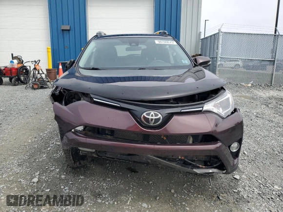 2018 Toyota RAV4 XLE with VIN 2T3RFREV2JW841670, listed as a Copart auction lot 50700675 with Not Provided miles and Salvage Title. Bid and sale history available at DreamBid. Image 5.