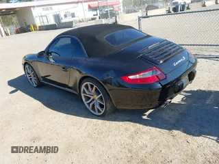2006 Porsche 911 Carrera S with VIN WP0CB29926S766815, listed as a IAAI auction lot 42078069 with 76,580 mi miles. Bid and sale history available at carsss.com. Image 3.