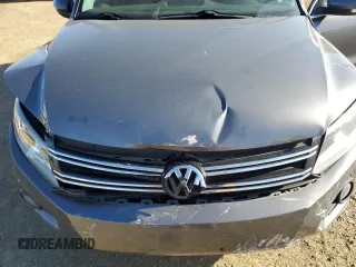 2014 Volkswagen Tiguan SEL with VIN WVGAV3AX0EW555873, listed as a Copart auction lot 55695955 with 69,984 mi miles and Salvage title. Bid and sale history available at DreamBid. Image 12.