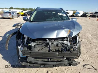 2023 Toyota Corolla Cross LE with VIN 7MUCAAAG8PV060228, listed as a Copart auction lot 86827224 with 40,395 mi miles and Salvage title. Bid and sale history available at DreamBid. Image 5.