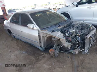 1999 Honda Accord LX with VIN JHMCG5644XC008965, listed as a IAAI auction lot 42871722 with 205,410 mi miles and . Bid and sale history available at DreamBid. Image 1.