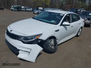 2017 Kia Optima LX with VIN 5XXGT4L35HG123998, listed as a IAAI auction lot 42106154 with 114,092 mi miles. Bid and sale history available at carsss.com. Image 2.