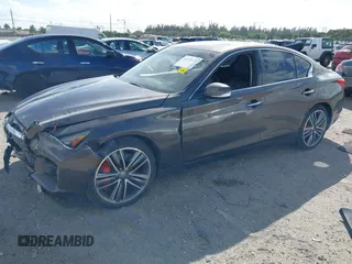 2014 Infiniti Q50 with VIN JN1BV7AP8EM679470, listed as a IAAI auction lot 41575121 with 84,880 mi miles. Bid and sale history available at carsss.com. Image 17.