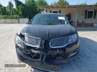 2016 Lincoln MKX Reserve with VIN 2LMTJ6LP9GBL27835, listed as a IAAI auction lot 42175905 with 87,541 mi miles. Bid and sale history available at carsss.com. Image 12.