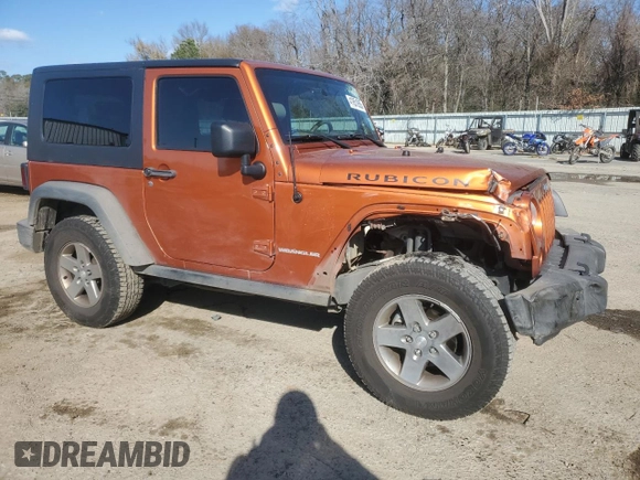 2010 Jeep Wrangler Rubicon with VIN 1J4BA6D17AL208835, listed as a Copart auction lot 41851855 with 107,771 mi miles and Salvage title. Bid and sale history available at DreamBid. Image 4.