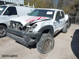 2013 Toyota Tacoma PreRunner with VIN 5TFJU4GN2DX044600, listed as a IAAI auction lot 41808602 with 191,243 mi miles. Bid and sale history available at carsss.com. Image 2.