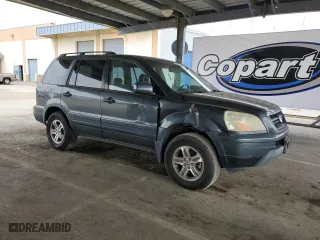 2004 Honda Pilot EX with VIN 2HKYF18484H530367, listed as a Copart auction lot 51463665 with 265,047 mi miles and Clean Title. Bid and sale history available at carsss.com. Image 4.