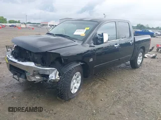 2004 Nissan Titan LE z VIN 1N6AA07A14N592255, wystawiony jako IAAI lot #42264477 z przebiegiem 191 259 mil mil oraz . Historia ofert i sprzedaży dostępna na DreamBid. Obrazek 2.