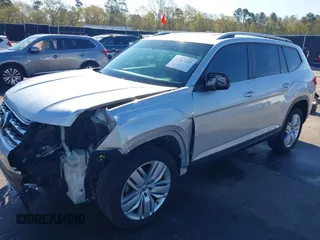 2019 Volkswagen Atlas SE with VIN 1V2UR2CA9KC527512, listed as a IAAI auction lot 41882212 with 102,765 mi miles and . Bid and sale history available at DreamBid. Image 2.