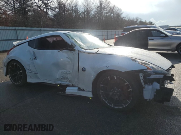 2015 Nissan 370Z with VIN JN1AZ4EH8FM441623, listed as a Copart auction lot 83181014 with 0 mi miles and Salvage Title. Bid and sale history available at carsss.com. Image 4.