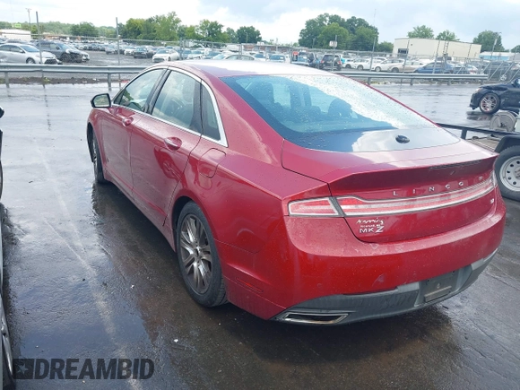 2015 Lincoln MKZ z VIN 3LN6L2GK8FR616005, wystawiony jako IAAI lot #42804770 z przebiegiem 241 352 mil mil oraz . Historia ofert i sprzedaży dostępna na DreamBid. Obrazek 3.