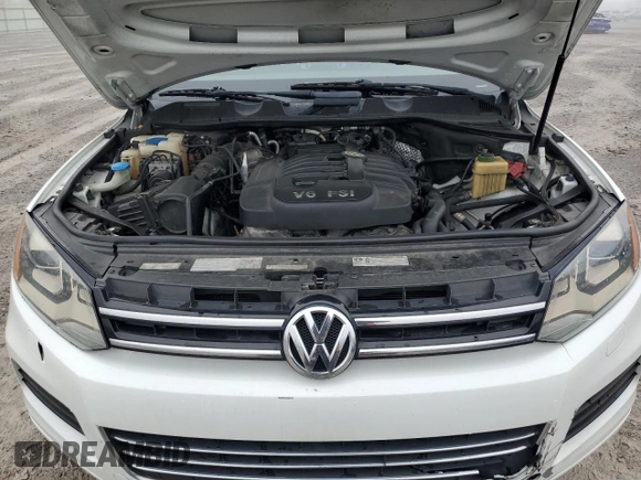 2012 Volkswagen Touareg Sport with VIN WVGEF9BP2CD010668, listed as a Copart auction lot 55306485 with 166,255 mi miles and Clean Title. Bid and sale history available at DreamBid. Image 12.