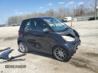 2009 Smart fortwo Pure z VIN WMEEJ31X49K219479, wystawiony jako Copart lot #52446625 z przebiegiem 82 337 mil mil oraz Szkody całkowita. Historia ofert i sprzedaży dostępna na DreamBid. Obrazek 4.