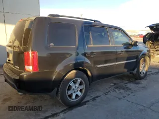 2010 Honda Pilot Touring with VIN 5FNYF3H83AB020730, listed as a Copart auction lot 84697994 with 238,329 mi miles and Salvage Title. Bid and sale history available at DreamBid. Image 3.