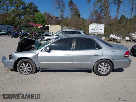 2002 Honda Accord SE z VIN 1HGCG66852A067989, wystawiony jako IAAI lot #41868854 z przebiegiem 177 905 mil mil oraz . Historia ofert i sprzedaży dostępna na DreamBid. Obrazek 14.