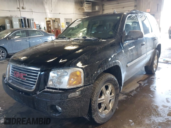 2007 GMC Envoy SLE with VIN 1GKDT13S472123167, listed as a IAAI auction lot 41385620 with 157,680 mi miles. Bid and sale history available at carsss.com. Image 2.