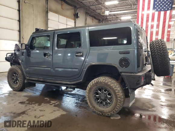 2006 Hummer H2 with VIN 5GRGN23U86H113357, listed as a Copart auction lot 75432754 with 170,799 mi miles and Salvage Title. Bid and sale history available at carsss.com. Image 2.