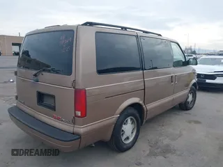 1996 GMC Safari with VIN 1GKDM19W3TB533427, listed as a IAAI auction lot 38894124 with 261,801 mi miles. Bid and sale history available at carsss.com. Image 4.
