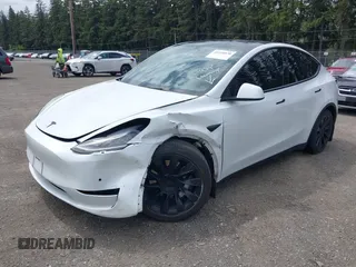 2022 Tesla Model Y Long Range z VIN 7SAYGDEE9NF494901, wystawiony jako IAAI lot #42310520 z przebiegiem 62 515 mil mil oraz . Historia ofert i sprzedaży dostępna na DreamBid. Obrazek 19.