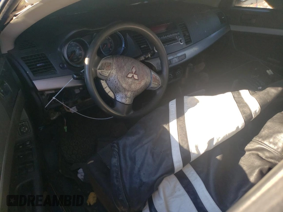 2009 Mitsubishi Lancer ES with VIN JA3AU26UX9U022011, listed as a Copart auction lot 74943964 with 129,312 mi miles and Salvage Title. Bid and sale history available at DreamBid. Image 8.