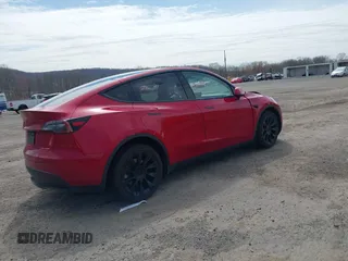 2021 Tesla Model Y Long Range with VIN 5YJYGDEE0MF209191, listed as a IAAI auction lot 41937507 with 56,131 mi miles. Bid and sale history available at carsss.com. Image 4.