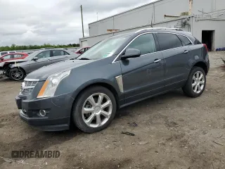 2013 Cadillac SRX Performance Collection with VIN 3GYFNDE39DS515335, listed as a Copart auction lot 56310365 with 165,233 mi miles and Clean title. Bid and sale history available at DreamBid. Image 1.