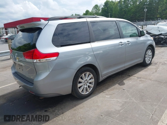 2013 Toyota Sienna XLE with VIN 5TDDK3DC3DS054803, listed as a IAAI auction lot 42389252 with 185,843 mi miles and . Bid and sale history available at DreamBid. Image 4.