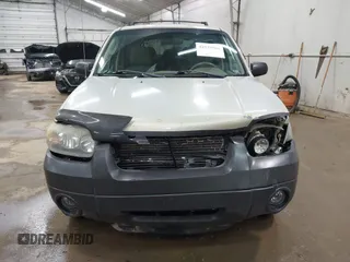 2005 Ford Escape XLT with VIN 1FMYU03115KA29039, listed as a IAAI auction lot 42159988 with 240,047 mi miles and . Bid and sale history available at DreamBid. Image 12.
