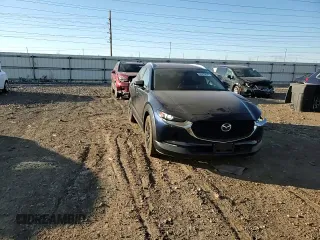 2022 Mazda CX-30 2.5 Turbo with VIN 3MVDMBAY8NM459690, listed as a Copart auction lot 84376874 with 24,723 mi miles and Salvage Title. Bid and sale history available at DreamBid. Image 11.