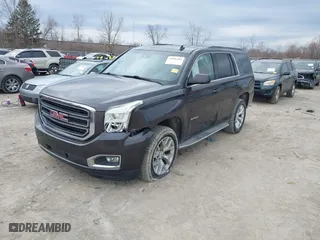 2015 GMC Yukon SLT with VIN 1GKS2BKC3FR113911, listed as a IAAI auction lot 41886403 with 200,090 mi miles. Bid and sale history available at carsss.com. Image 17.