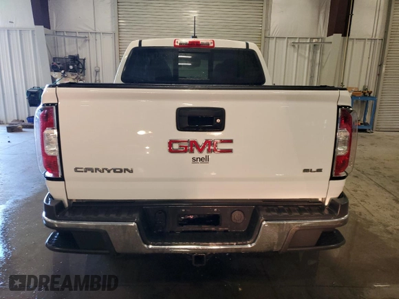 2016 GMC Canyon z VIN 1GTP6CE11G1366053, wystawiony jako Copart lot #85769384 z przebiegiem 134 303 mil mil oraz Szkoda całkowita • Salvage title. Historia ofert i sprzedaży dostępna na DreamBid. Obrazek 6.