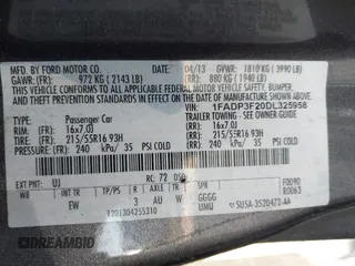 2013 Ford Focus SE with VIN 1FADP3F20DL325958, listed as a IAAI auction lot 41997500 with 195,793 mi miles. Bid and sale history available at carsss.com. Image 9.